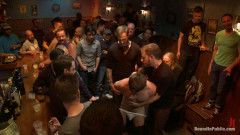 Ripped stud with a giant cock get used in a crowded bar