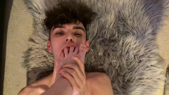 Cole sucks and licks Callum's feet, cums