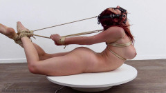 Little Lanta - hogtied on the rotating display | Download from Files Monster